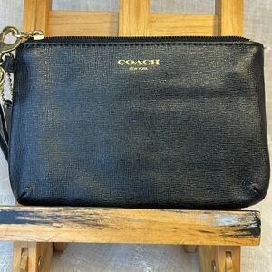 Coach almost new leather wallet with wrist leash